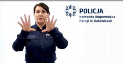 Policjant migający komunikat dla osób niesłyszących